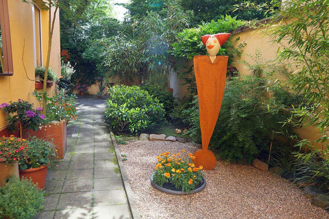 Susanne Boerner: 'Grossfigur: Koerper Ausrufezeichen - Kopf Dolores_orange'